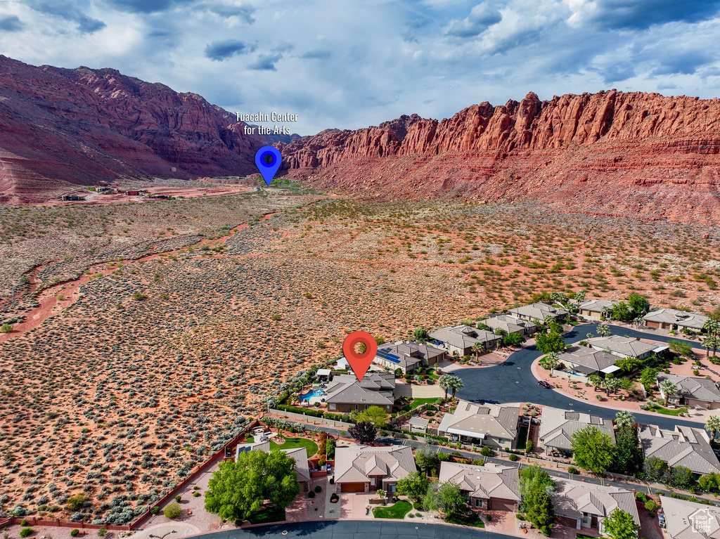 Property view of mountains featuring a residential view
