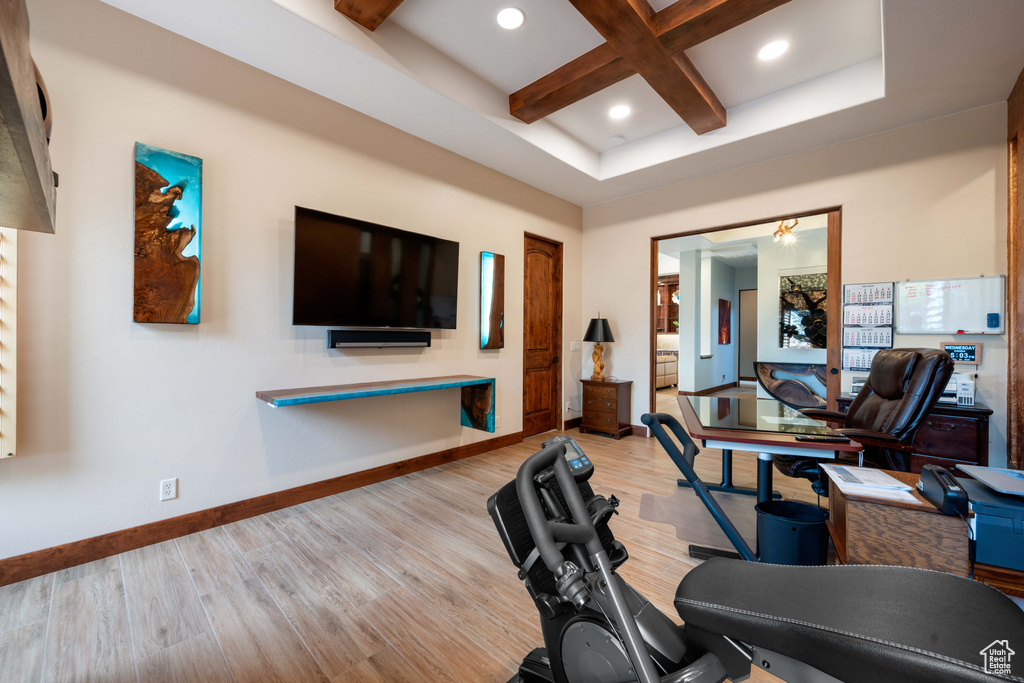 Exercise room featuring baseboards, recessed lighting, light wood-style flooring, and coffered ceiling