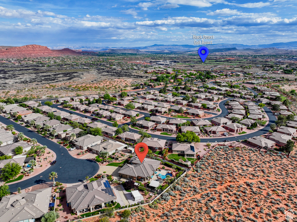 Drone / aerial view featuring a residential view and a mountain view