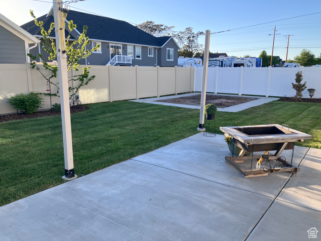 View of yard with a patio