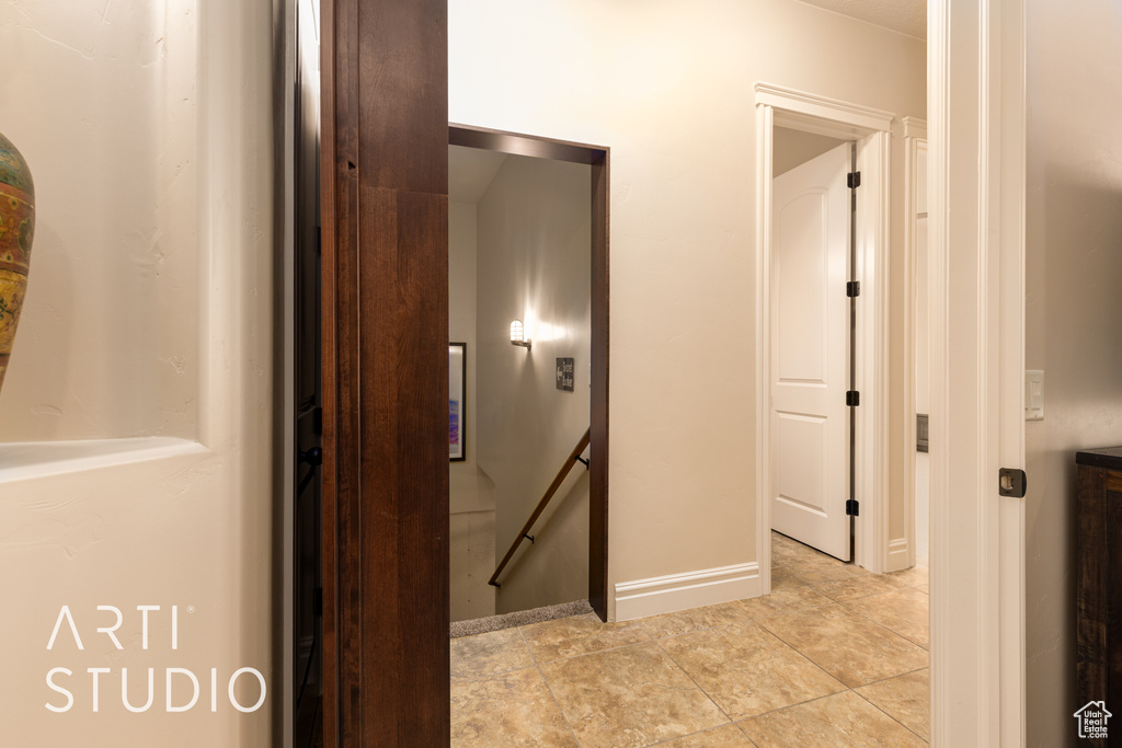 Hallway featuring an upstairs landing