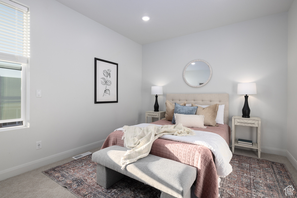 Bedroom featuring visible vents, recessed lighting, carpet, and baseboards