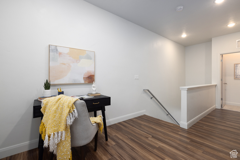 Office space with recessed lighting, baseboards, and wood finished floors