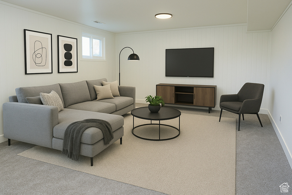 Living area with visible vents, baseboards, crown molding, and carpet floors