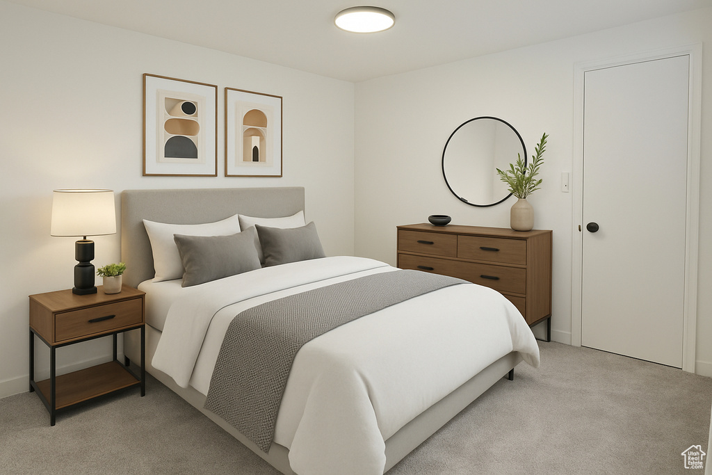 Bedroom featuring light colored carpet and baseboards