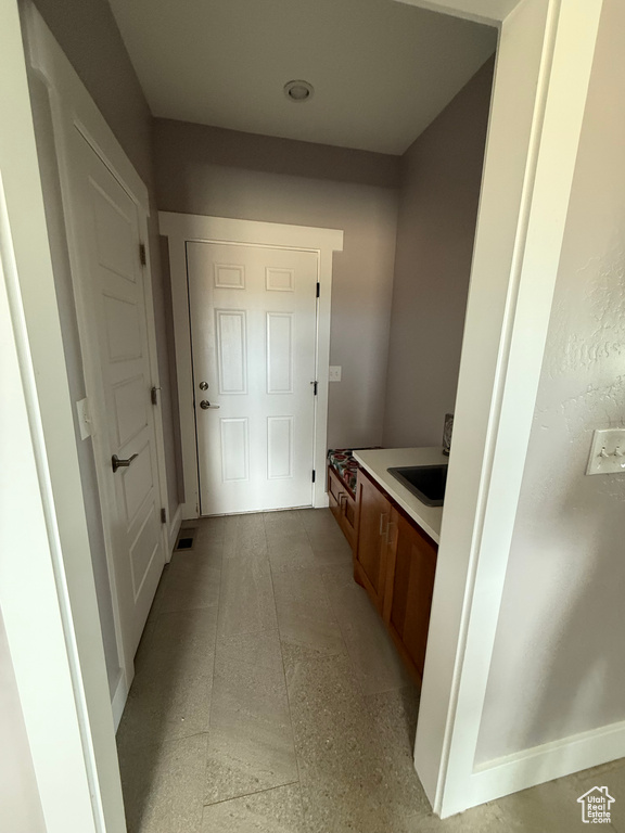 Interior space featuring baseboards and visible vents