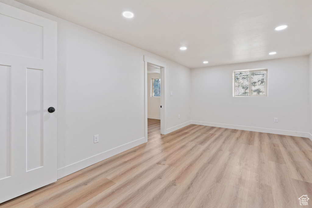 Interior space featuring light wood-style floors, baseboards, and recessed lighting