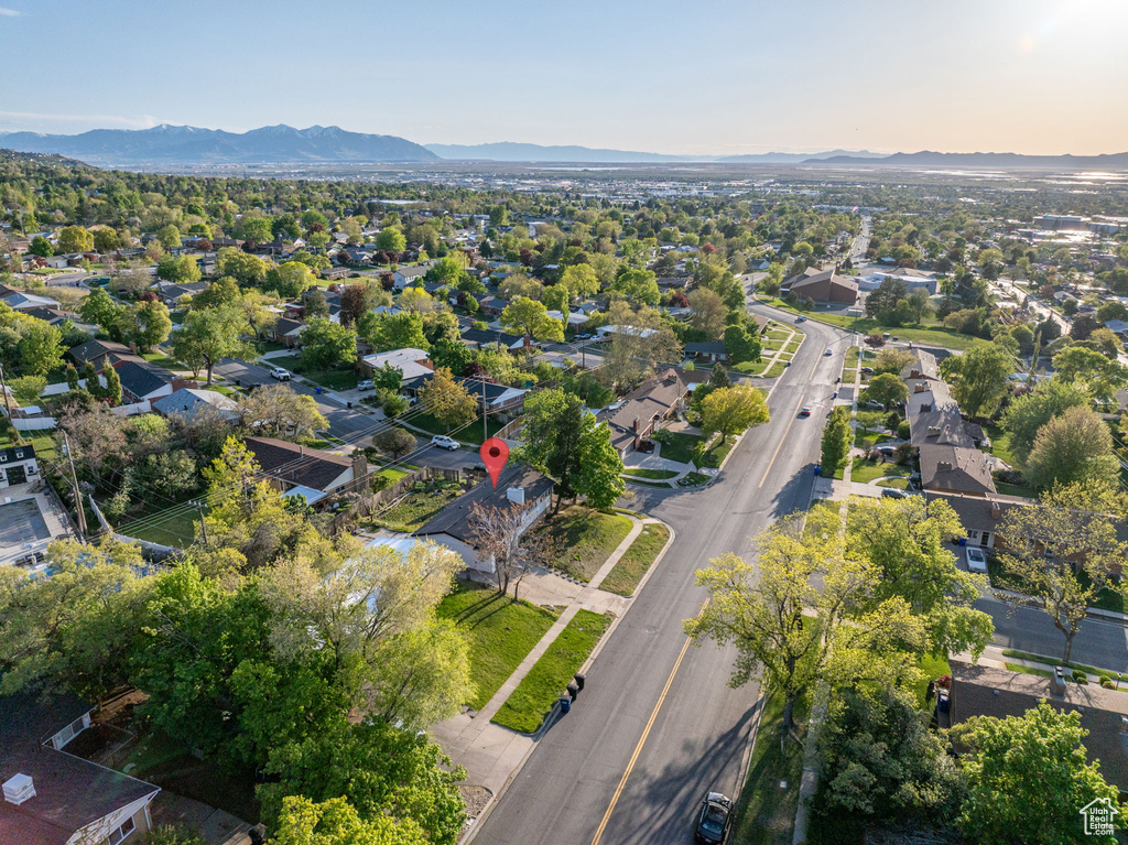 Birds eye view of property featuring a mountain view and a residential view