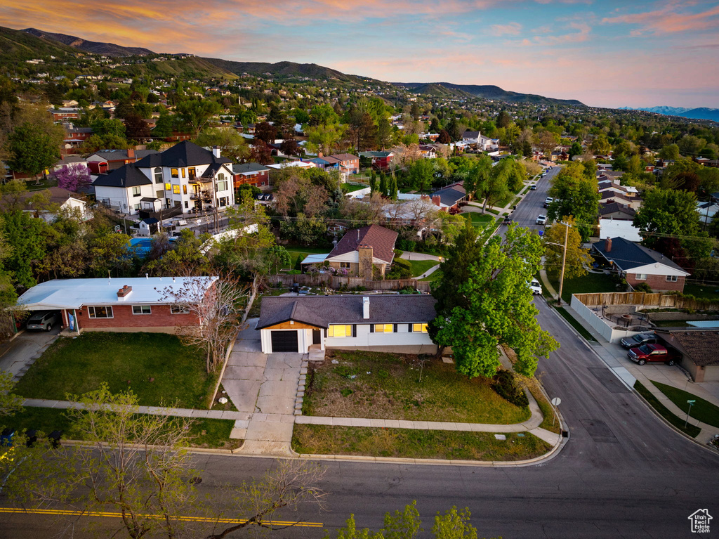 Aerial view at dusk with a mountain view and a residential view