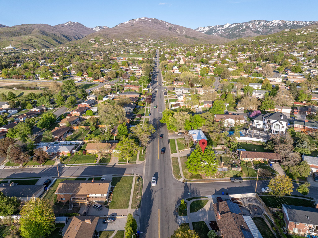 Drone / aerial view featuring a residential view and a mountain view