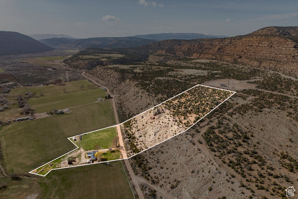 Aerial view featuring a mountain view and a rural view