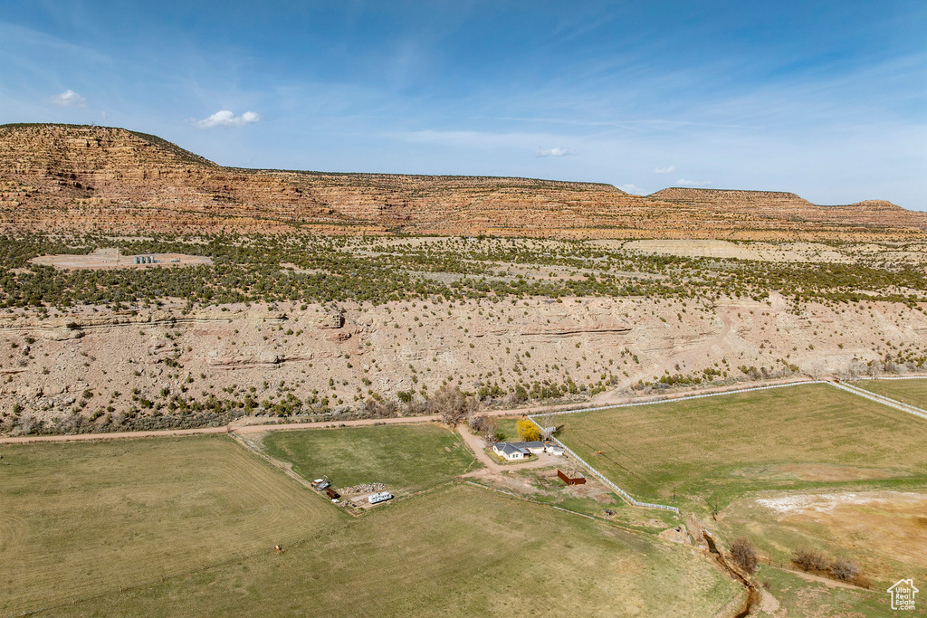 Birds eye view of property with a rural view and a mountain view