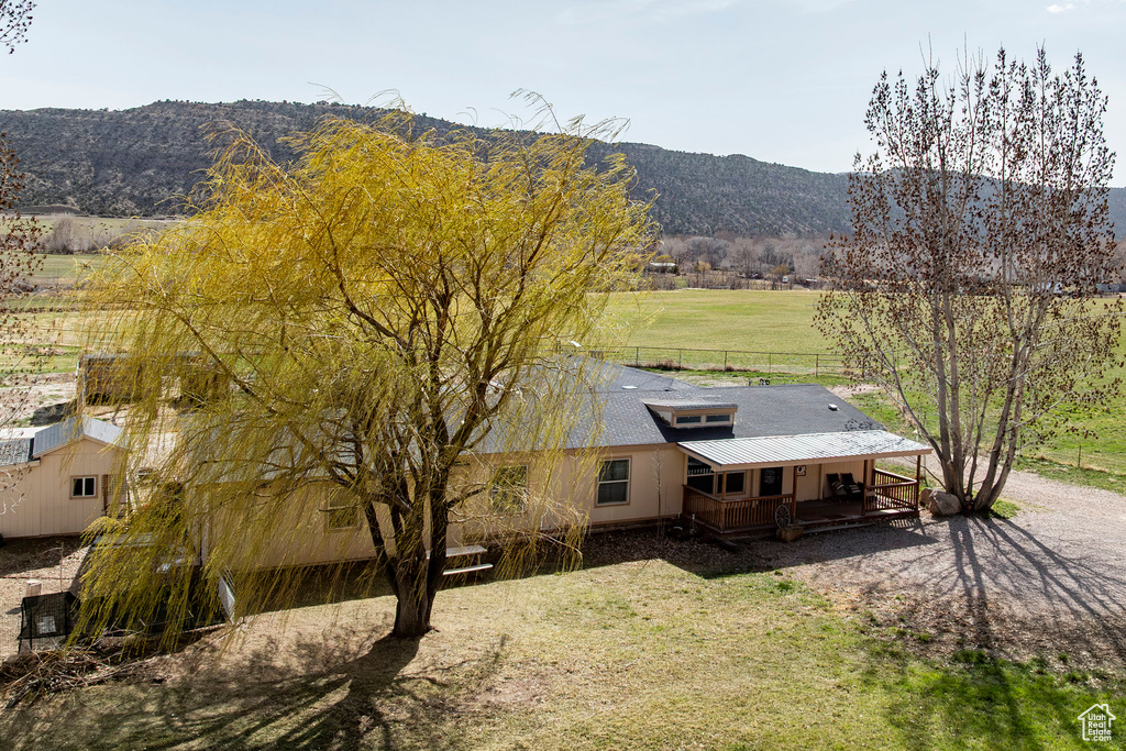 Aerial view featuring a mountain view and a rural view