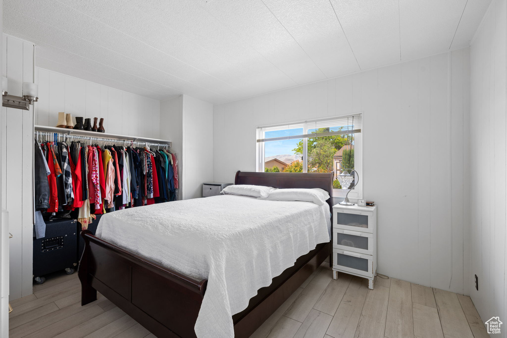 Bedroom with light wood-type flooring