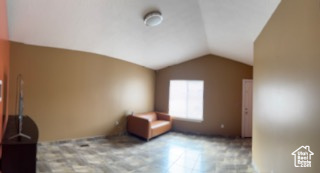 Bonus room featuring vaulted ceiling