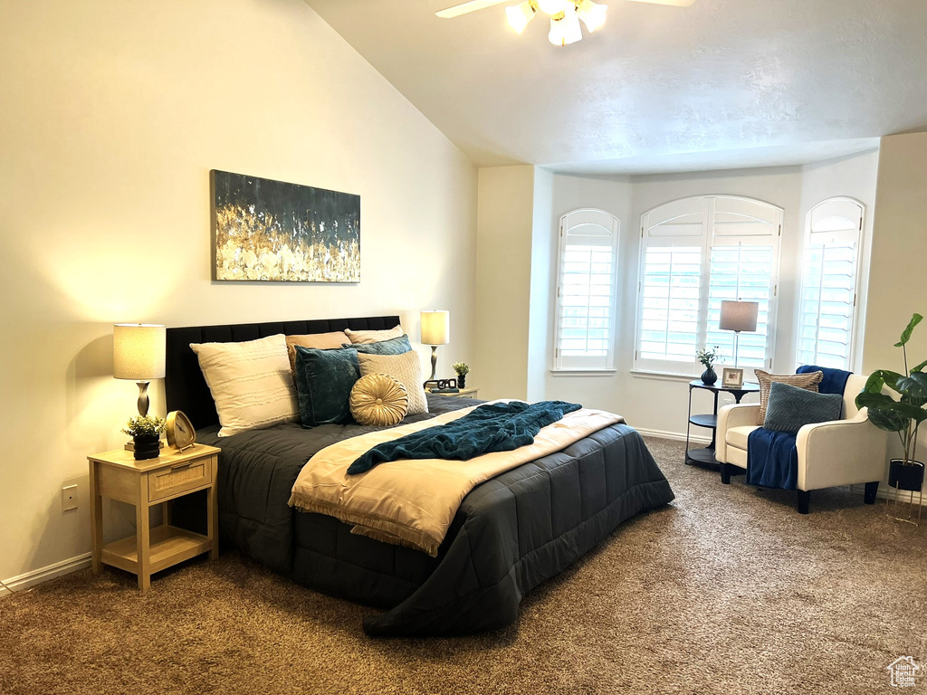 Bedroom featuring baseboards and carpet floors