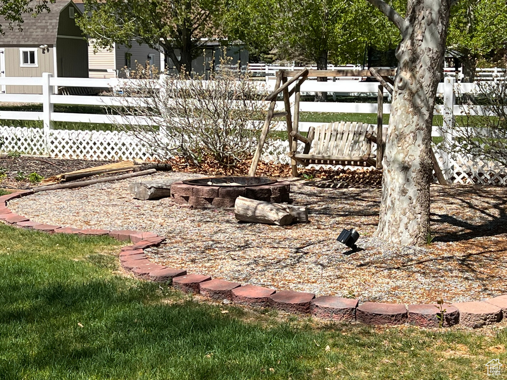 View of yard featuring fence
