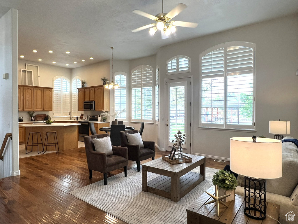 Living room featuring hardwood / wood-style flooring and a wealth of natural light