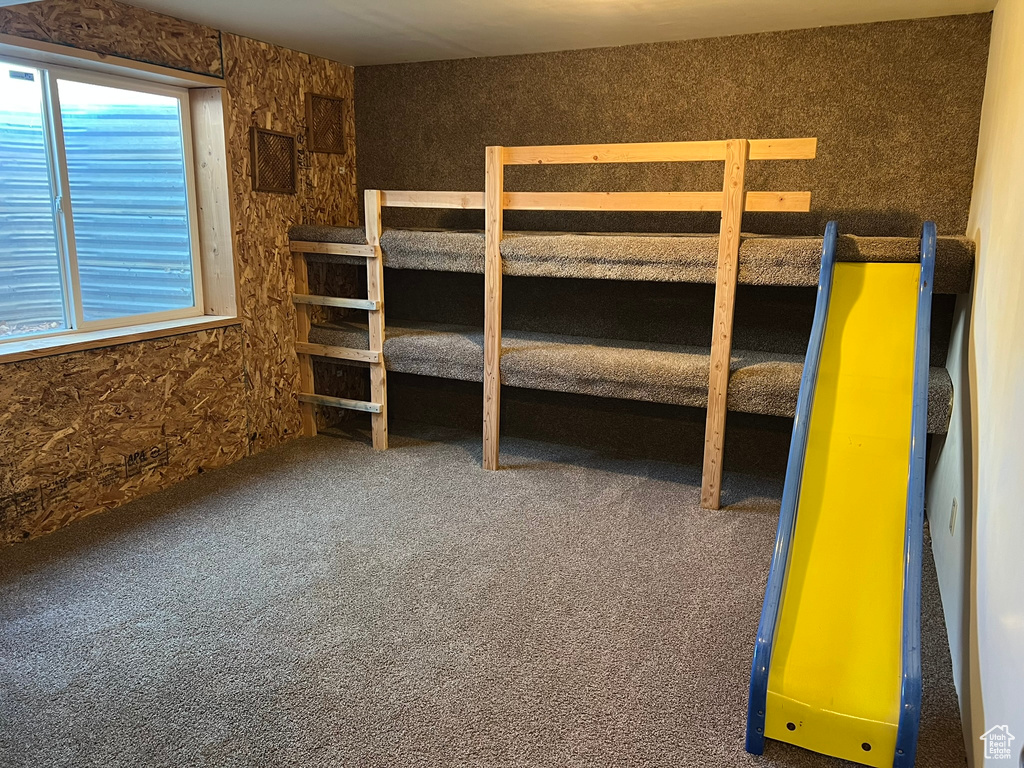Unfurnished bedroom with carpet flooring