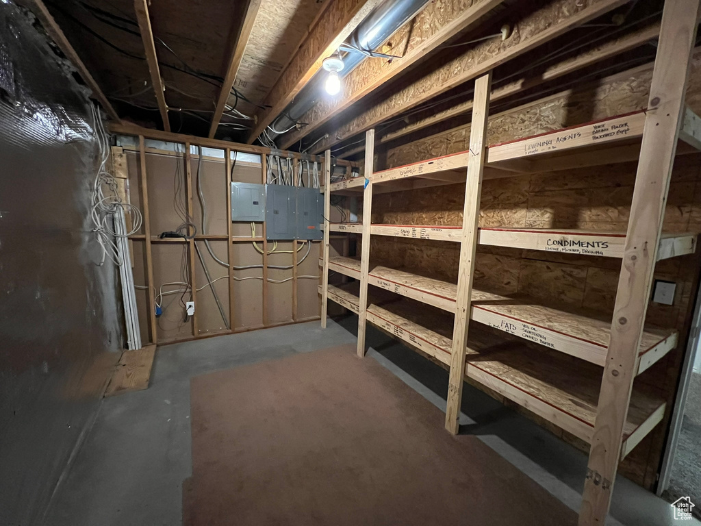 Storage room featuring electric panel