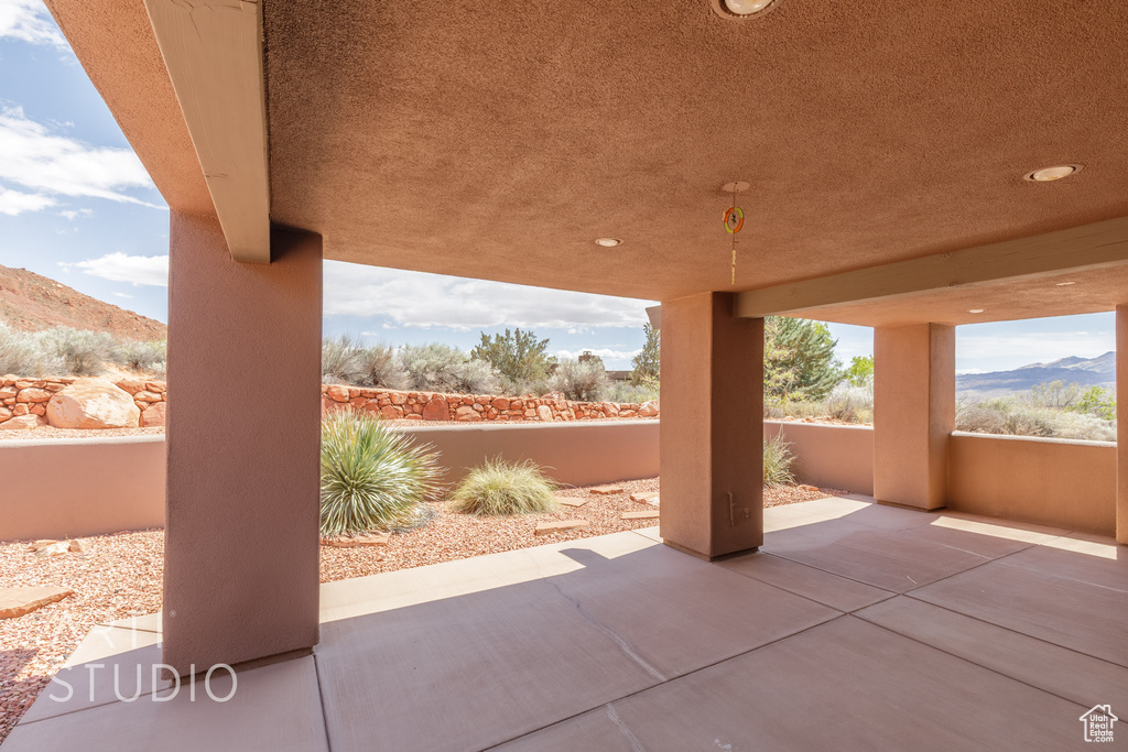 View of patio / terrace with a mountain view