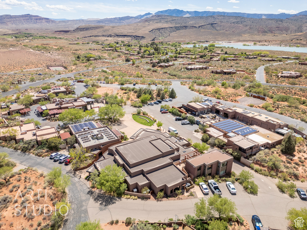 Drone / aerial view with a water and mountain view