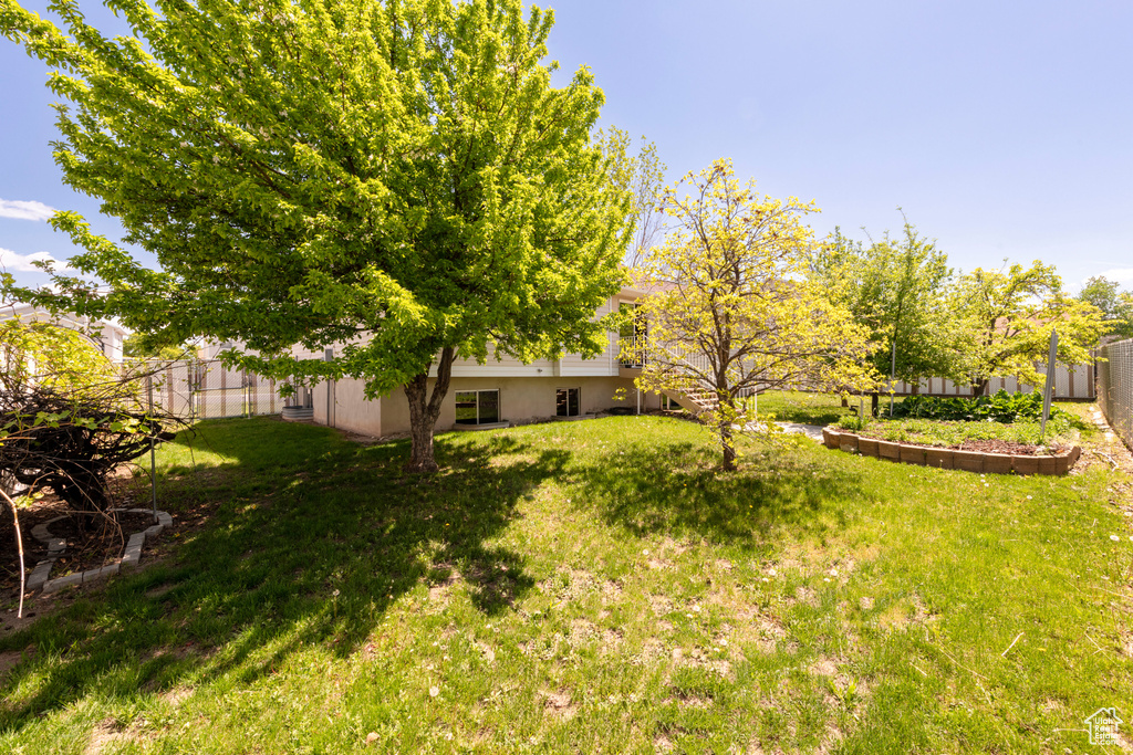 View of yard with fence