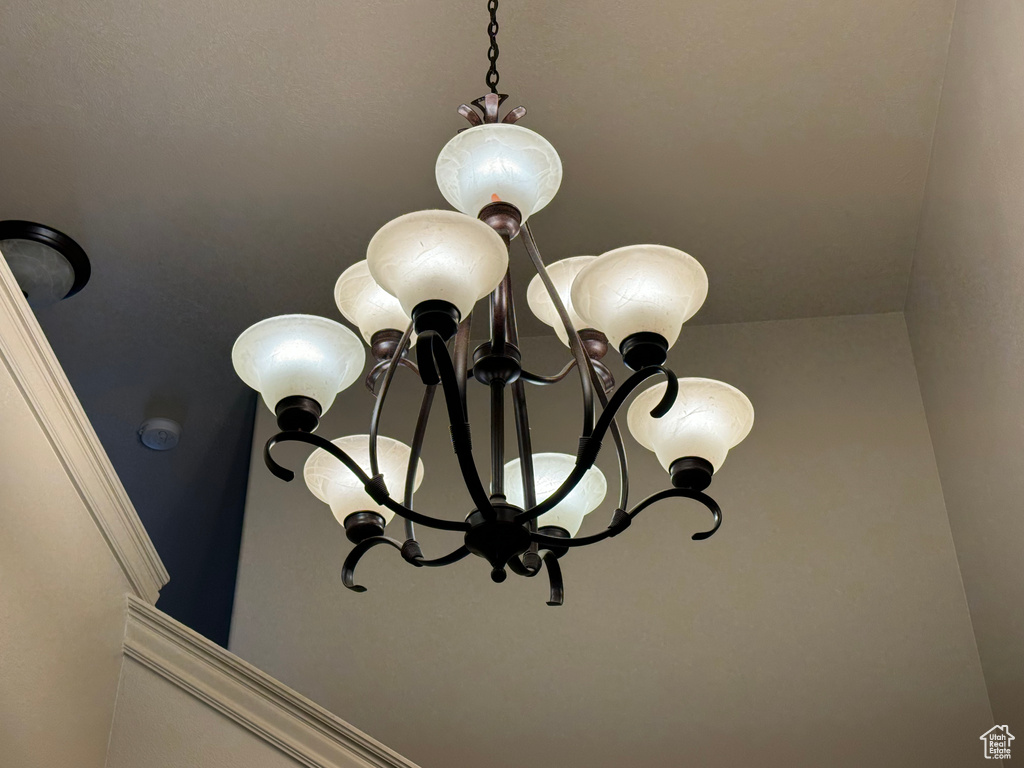 Room details featuring a notable chandelier