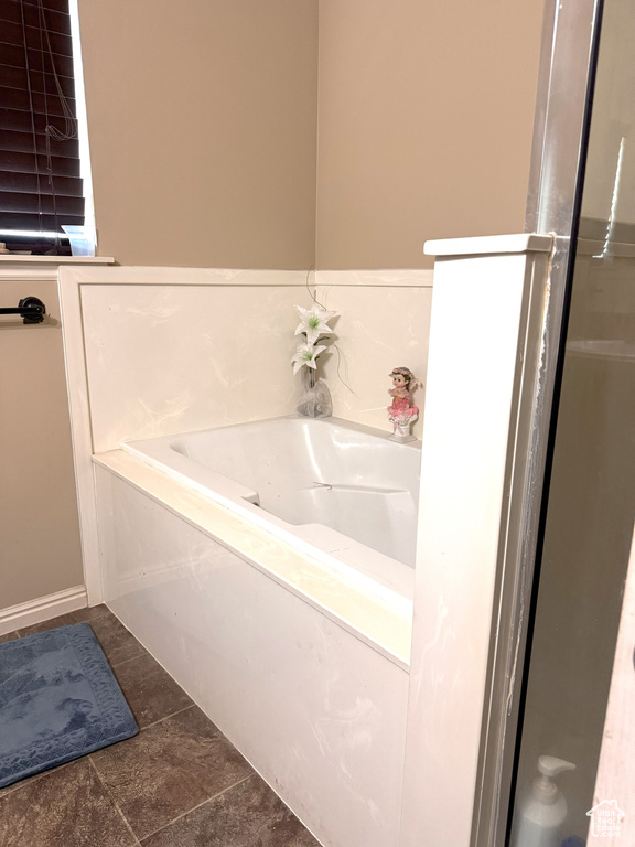 Full bath with a garden tub