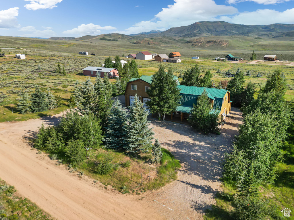 Aerial view with a mountain view and a rural view