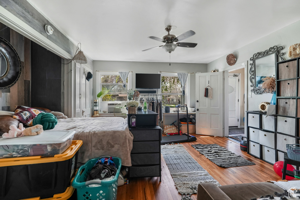 Bedroom featuring a ceiling fan and wood finished floors