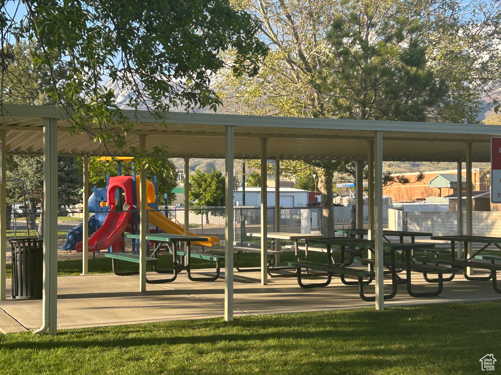 Communal playground featuring fence