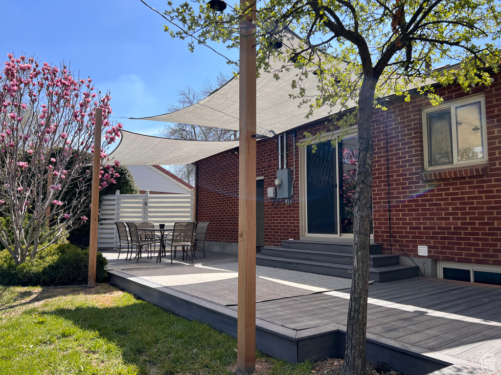 Exterior space featuring fence and entry steps