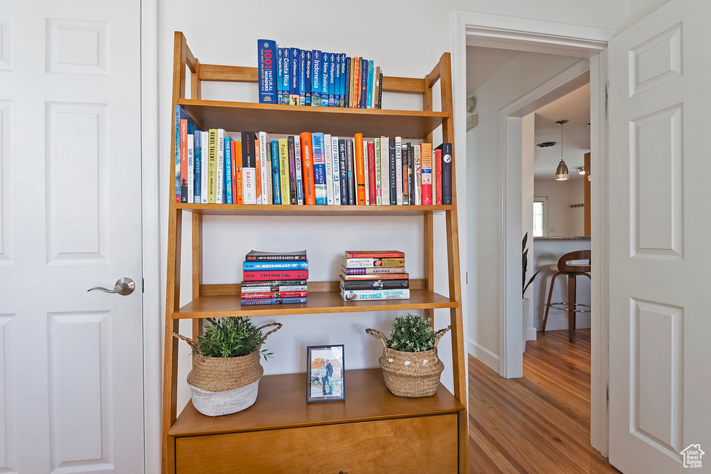 Interior details featuring baseboards and wood finished floors