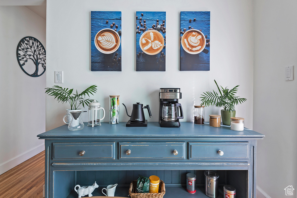 Interior details with baseboards and wood finished floors