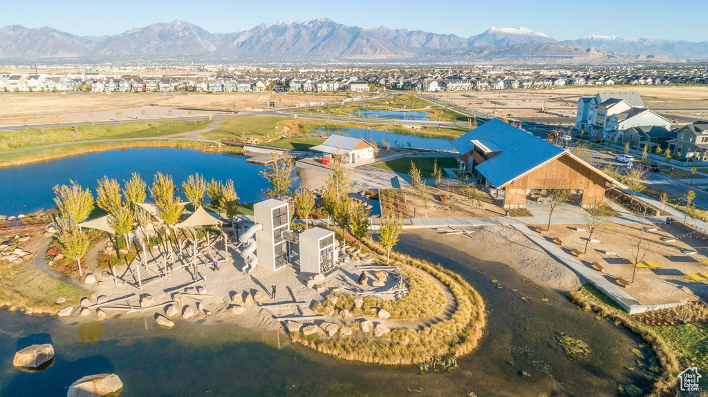 Drone / aerial view featuring a residential view and a water and mountain view
