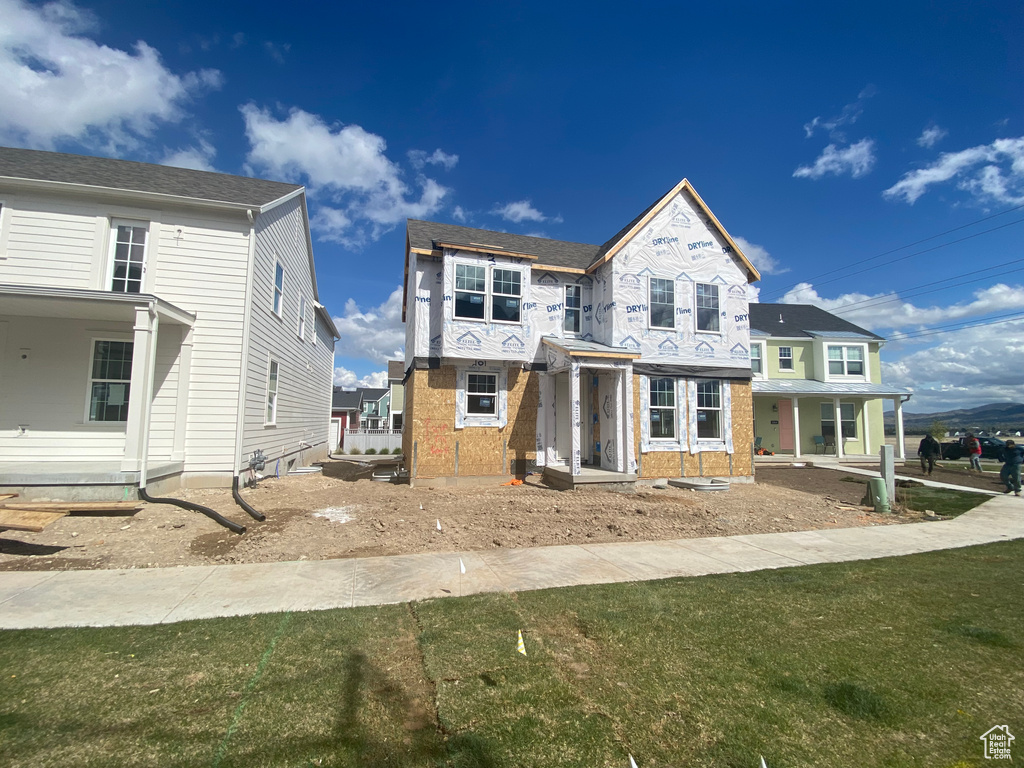 View of front of house with brick siding