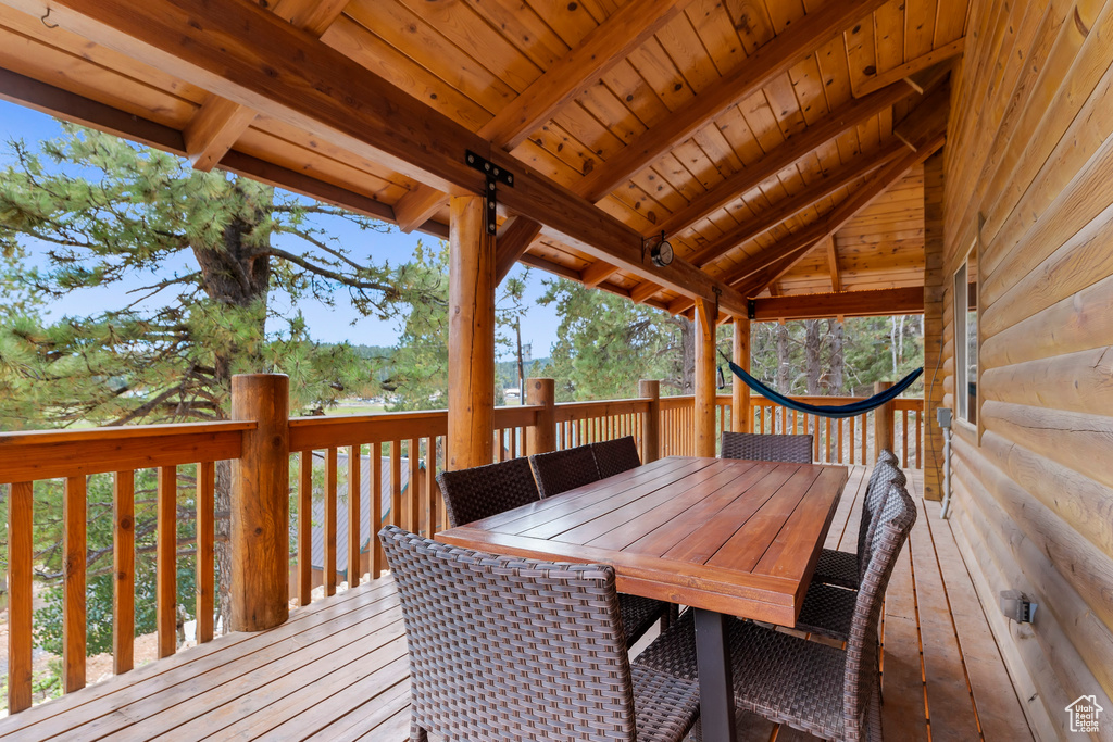 Wooden terrace with outdoor dining space