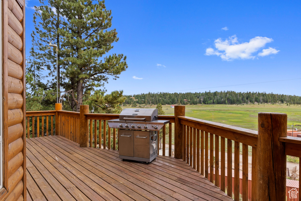 Wooden deck with a grill