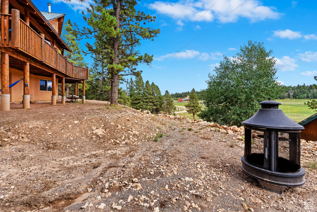 View of yard featuring a deck