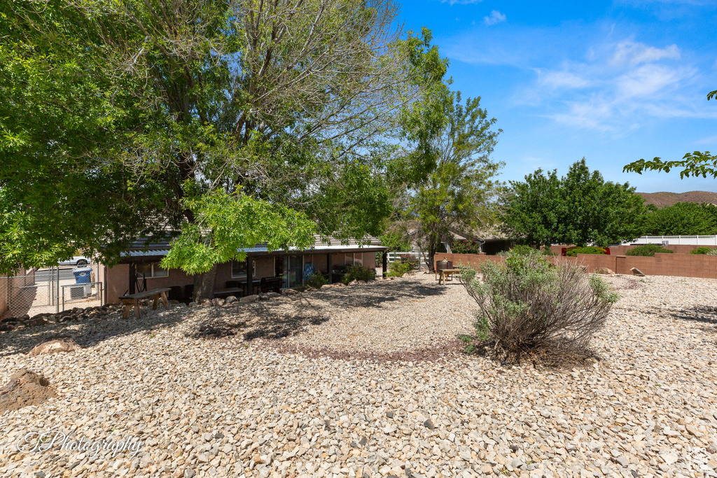 View of yard with fence