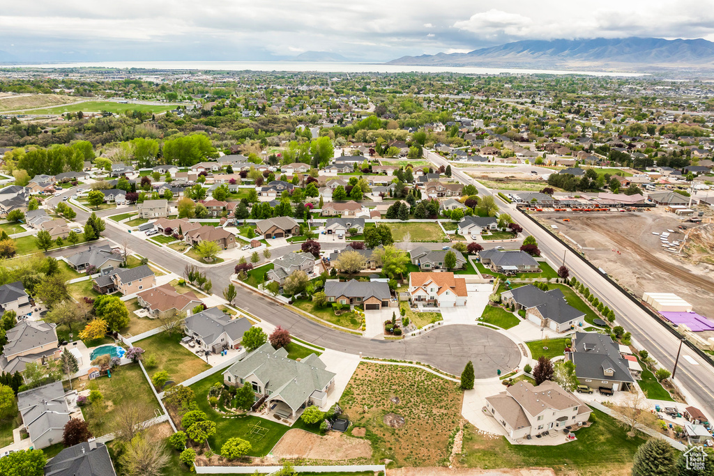 Birds eye view of property featuring a mountain view and a residential view