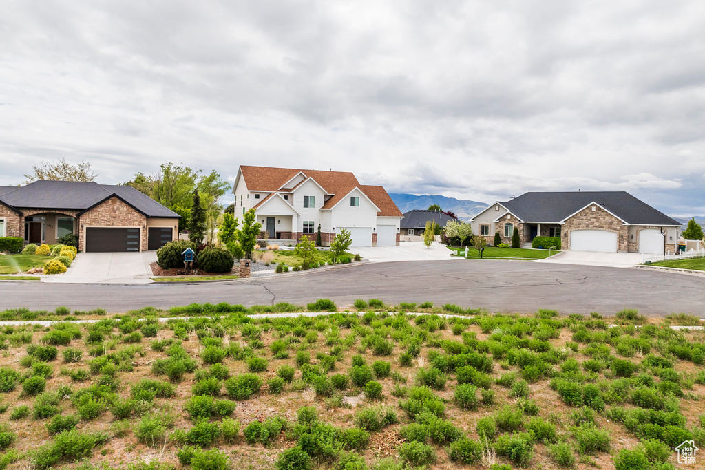 Exterior space featuring a residential view and curbs