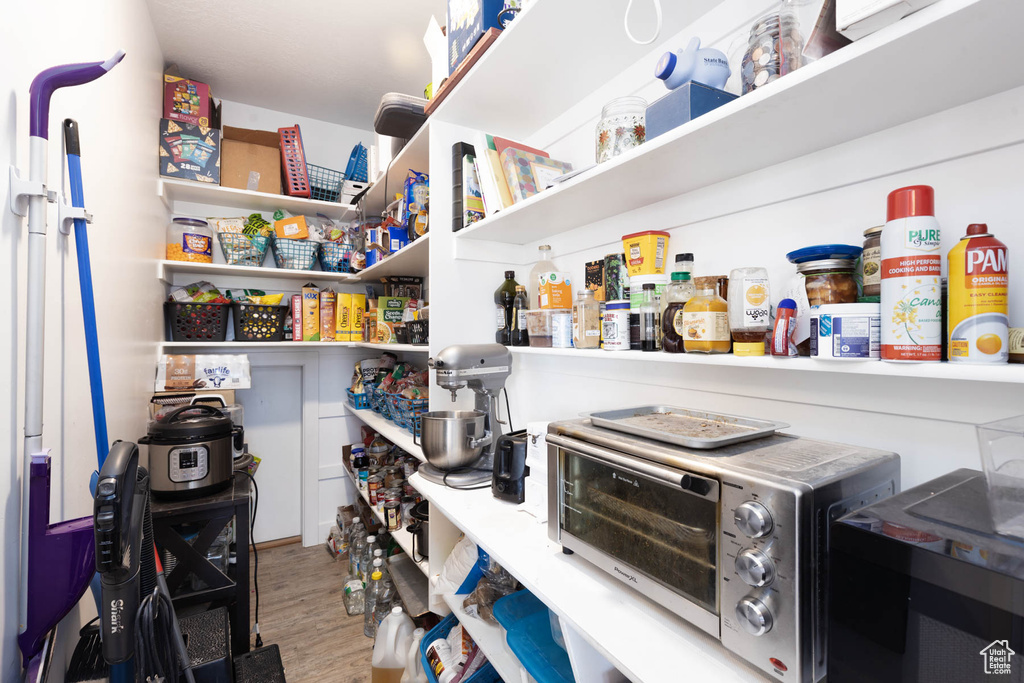 Pantry featuring a toaster