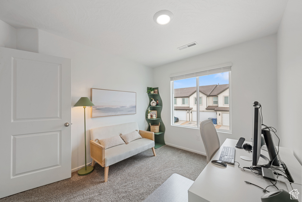 Office featuring visible vents, carpet flooring, and baseboards