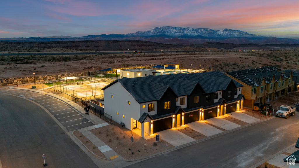 Aerial view at dusk featuring a mountain view
