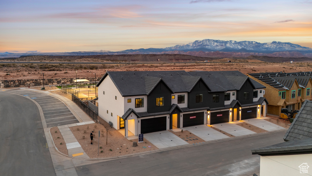 Drone / aerial view featuring a residential view and a mountain view