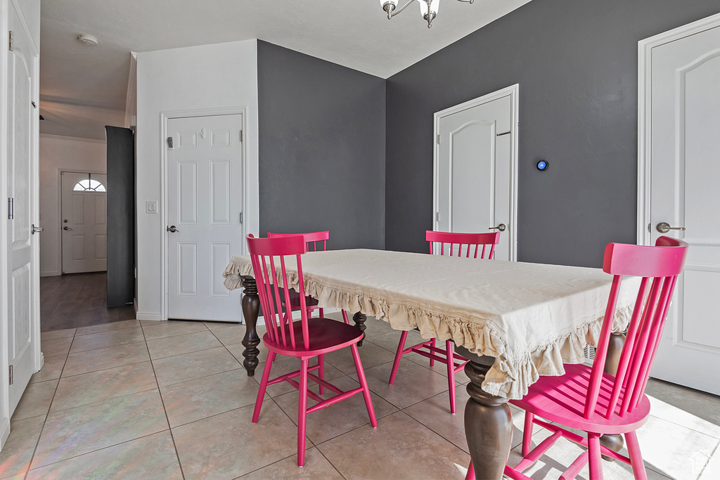 Dining room featuring light tile patterned floors