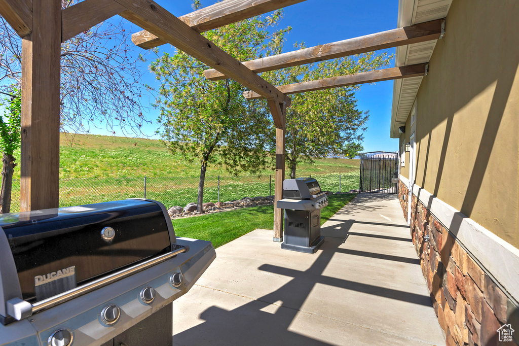 View of patio featuring grilling area