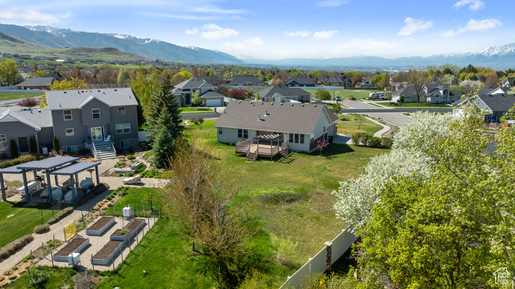 Drone / aerial view with a mountain view and a residential view